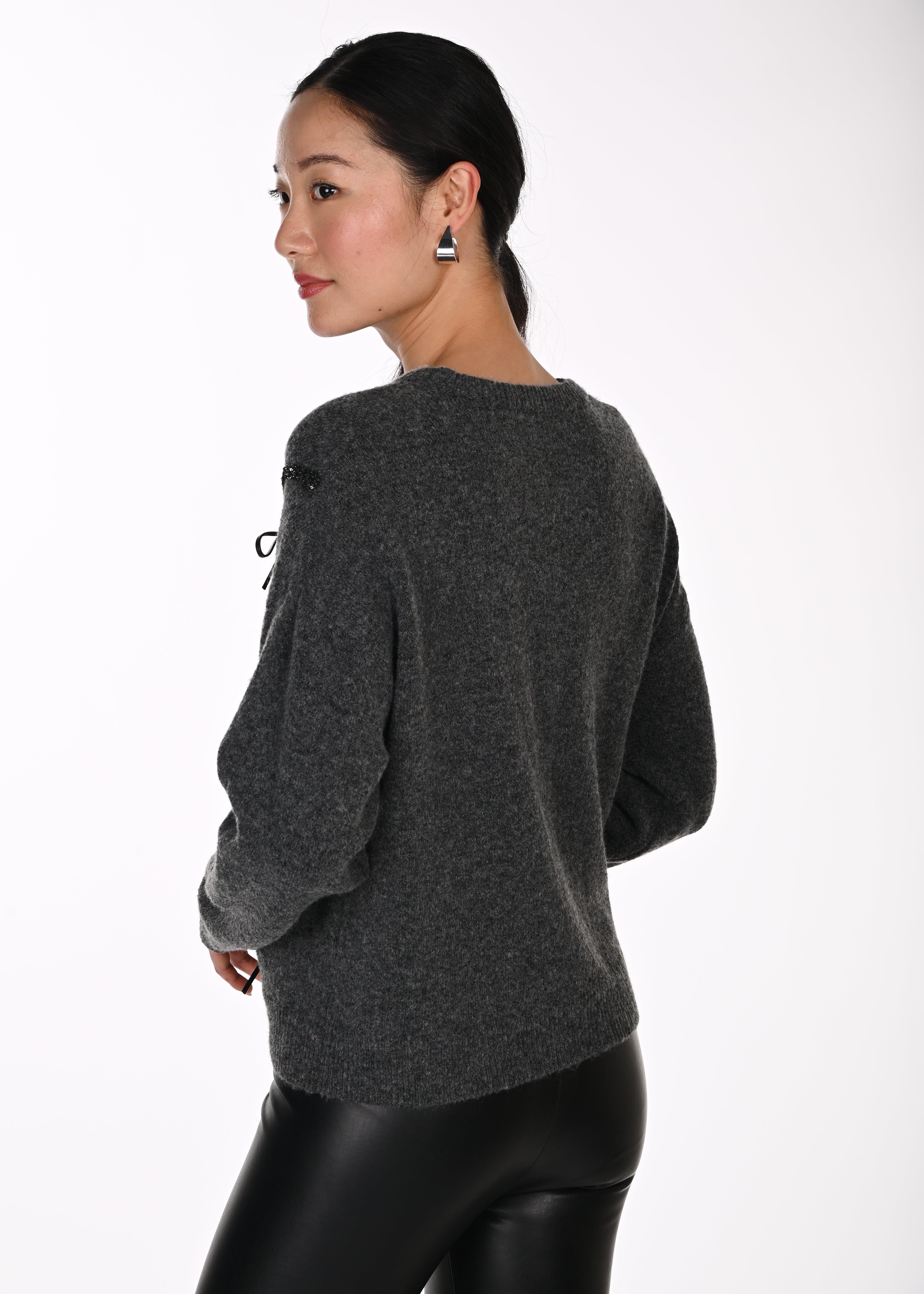 Elko | Pull avec pastilles et boucles