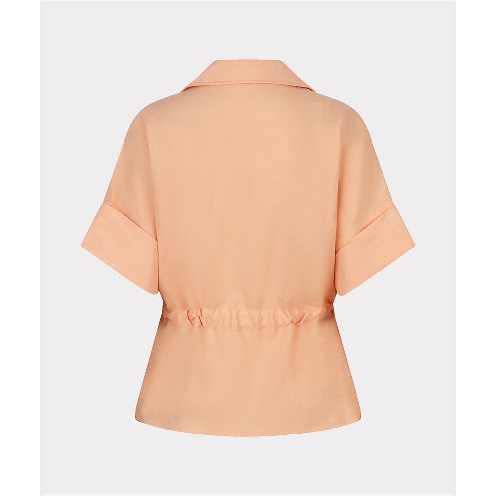 Blouse à fermoir et  taille nouée