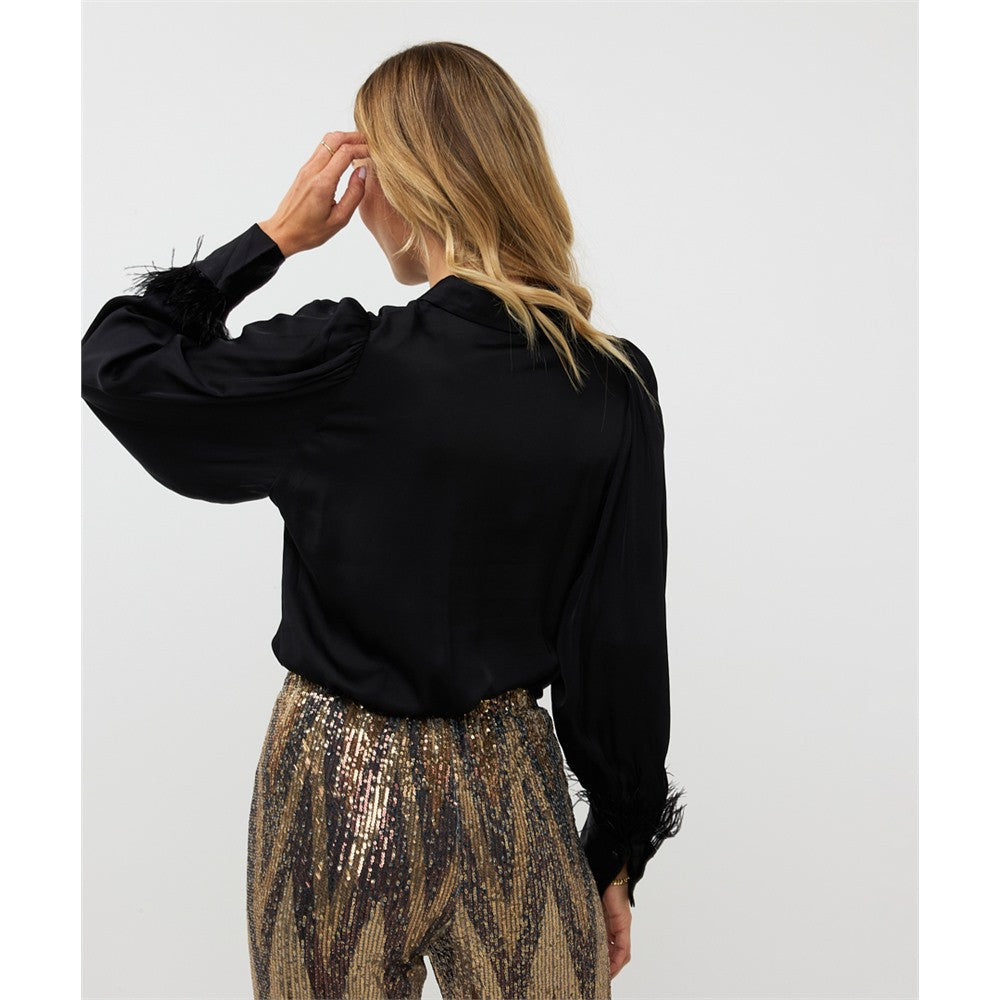 Blouse avec plumes