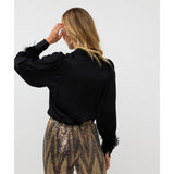 Blouse avec plumes