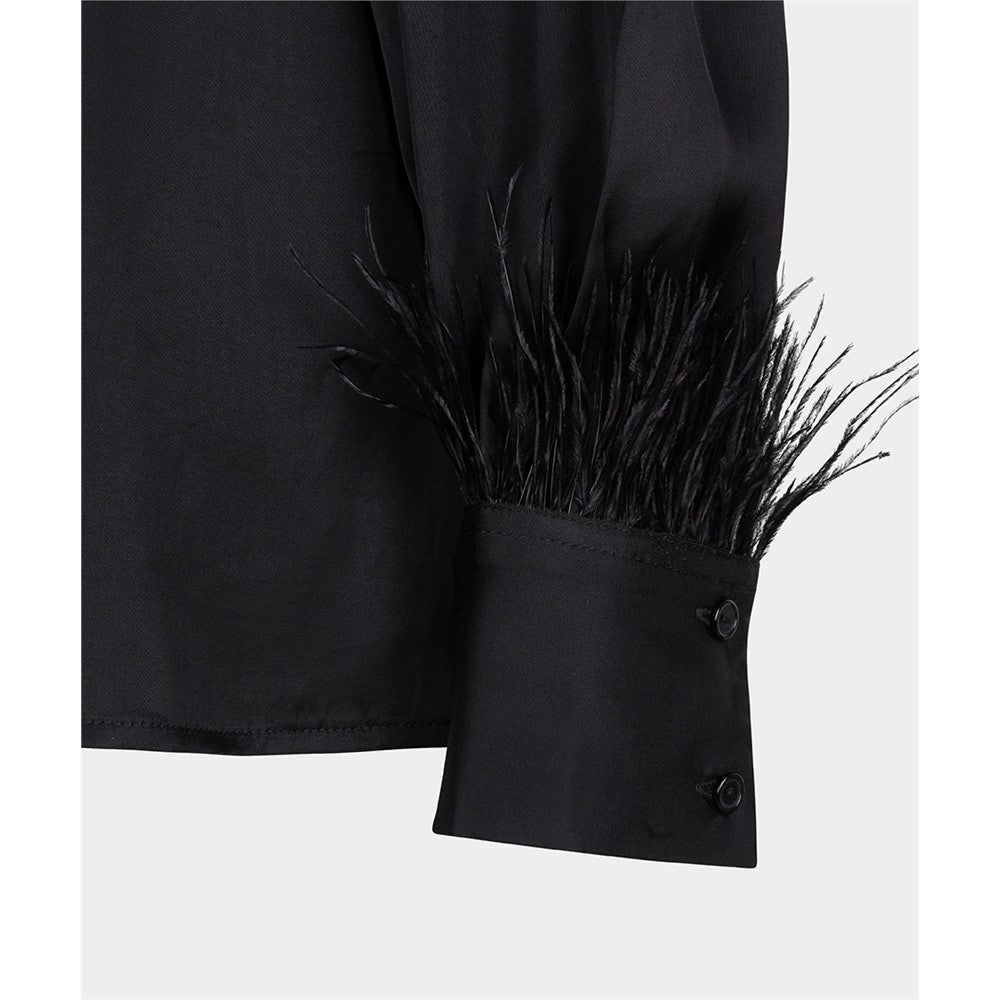 Blouse avec plumes