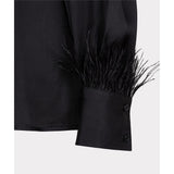 Blouse avec plumes