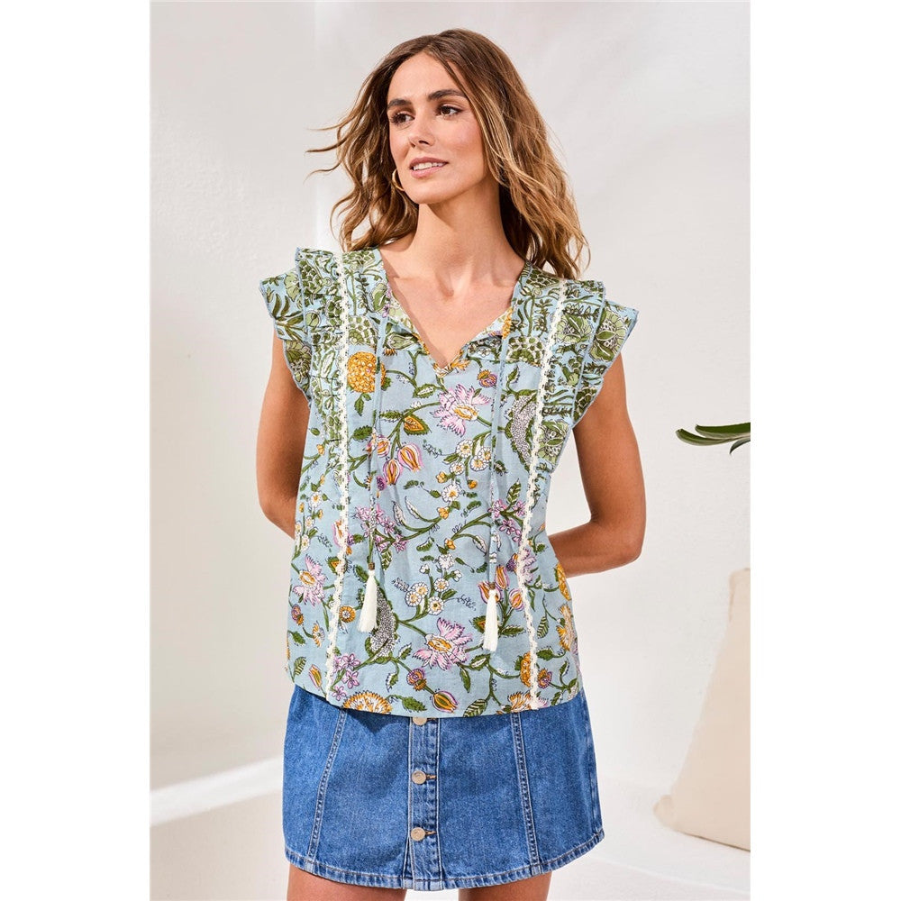 Blouse florale à volants avec liens décoratifs