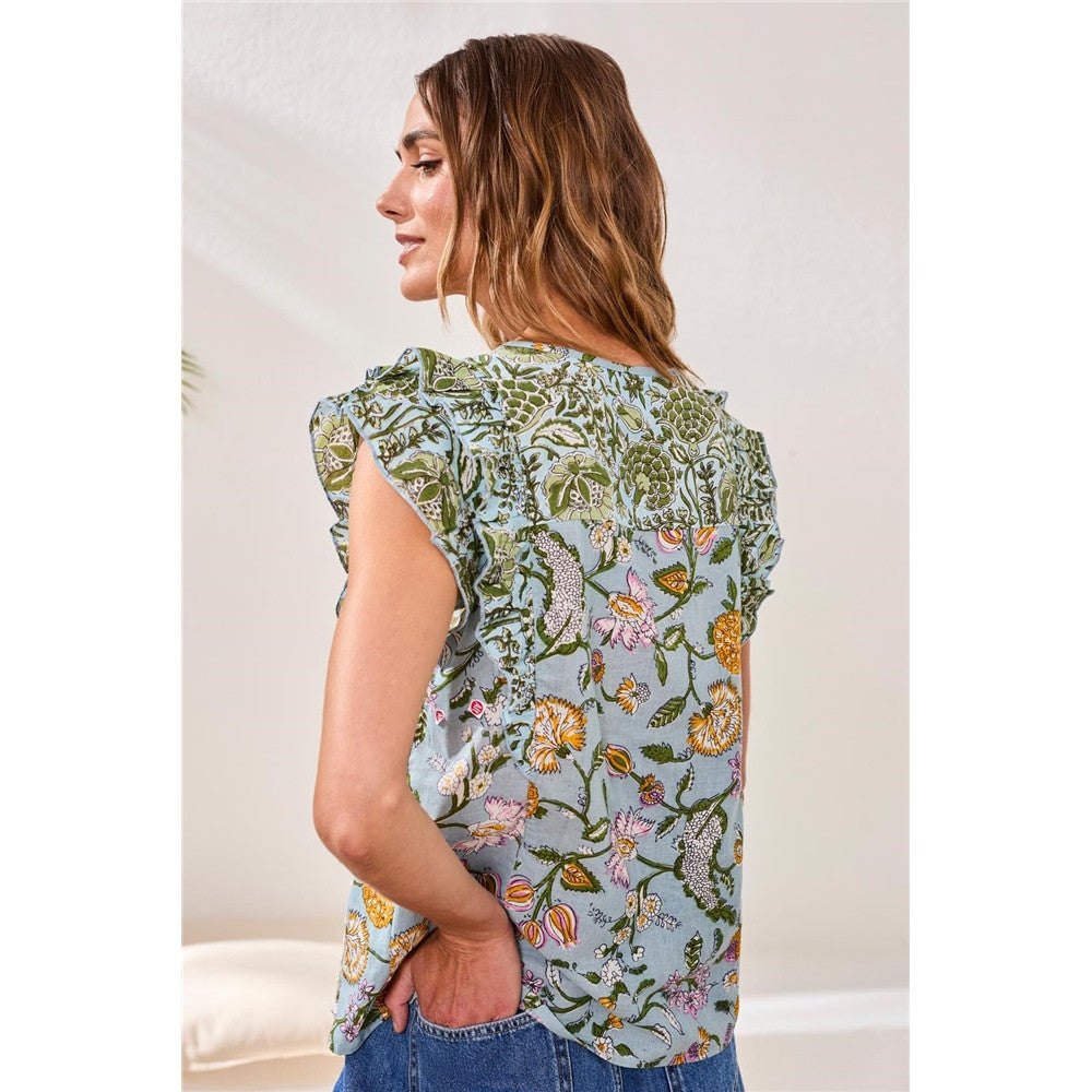 Blouse florale à volants avec liens décoratifs