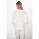 Chandail avec broche en forme de fleur