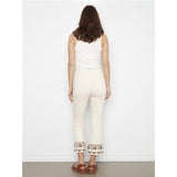 Pantalon à ourlet brodé