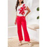 Pantalon cheville et broderie aux poches