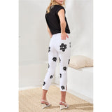 Pantalon étroit avec imprimé fleur