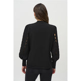 Tricot avec ouvertures aux manches