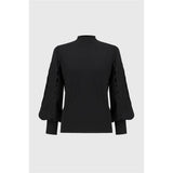 Tricot avec ouvertures aux manches